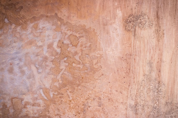 Photo red dirty plaster wall ancient background and texture