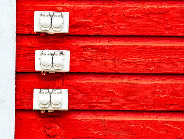 Red door on brick wall