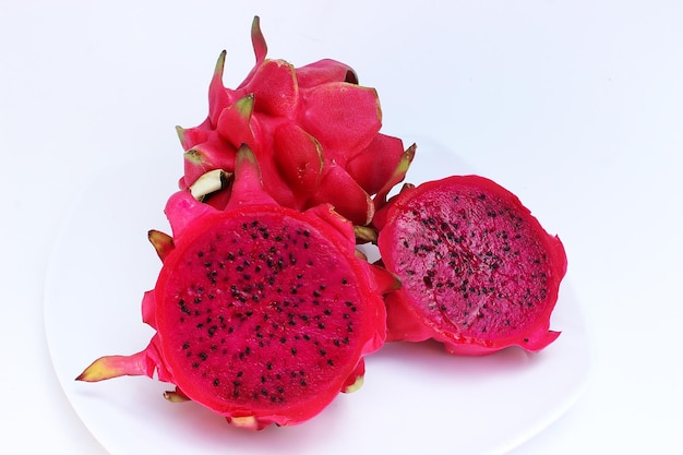 Red dragon fruit on white background