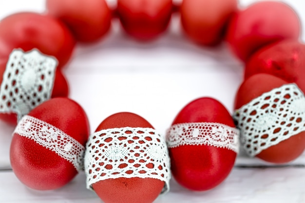 Red Easter eggs on a white background