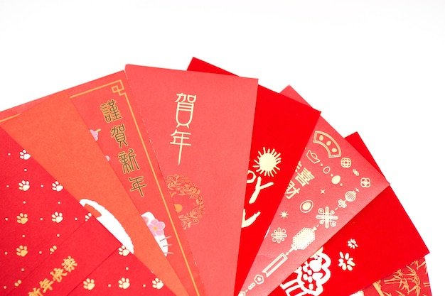 Premium Photo  Red envelope packet chinese new year, hongbao with the  character 'happy new year' on white background for chinese new year.  translation: good luck in the year