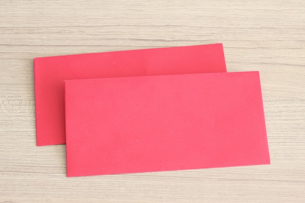 red envelope on the wooden background