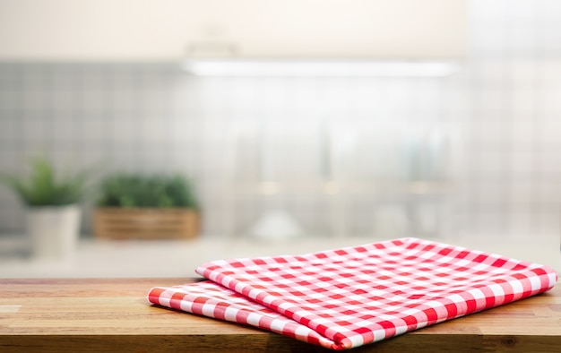 Red fabric cloth on wood tabletop