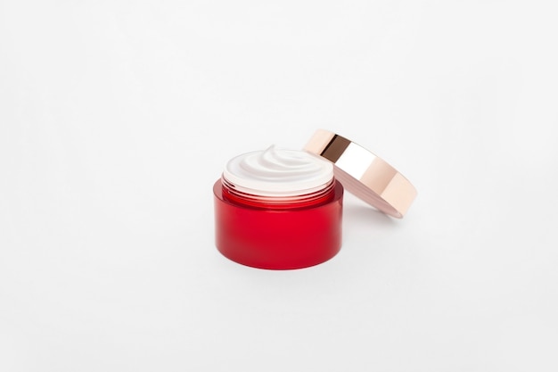 Photo red face cream tube mockup