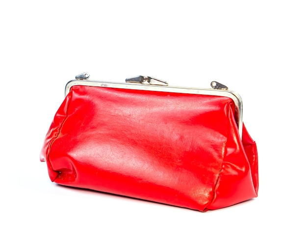 Photo red female cosmetic bag on a white background