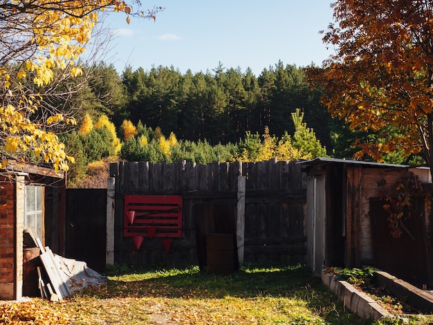 Red fire shield on the fence in the village