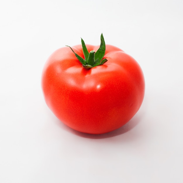 Photo red, fresh, juicy tomato, isolated