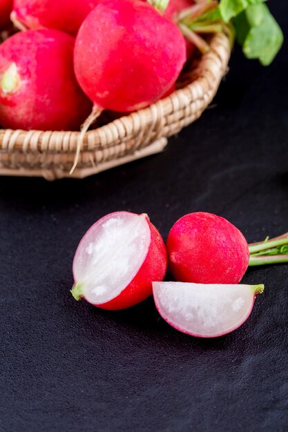 Red fresh radish on wooden