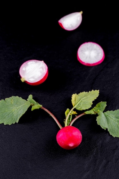 Red fresh radish on wooden