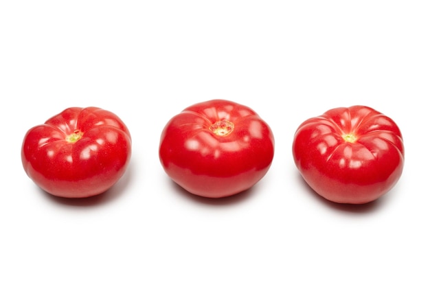 Red fresh tomato isolated on white background