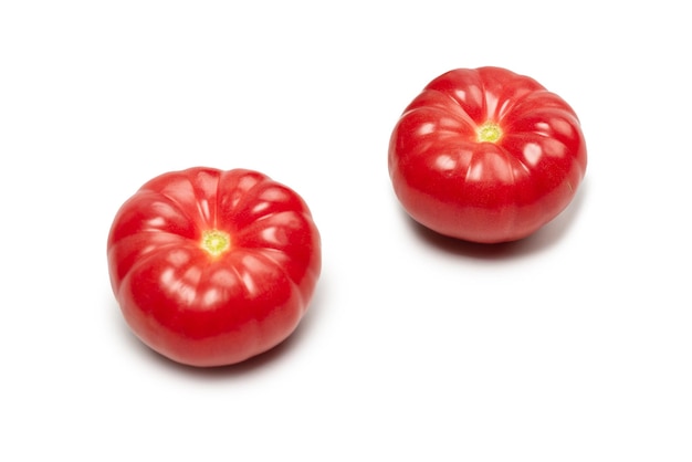 Red fresh tomato isolated on white background