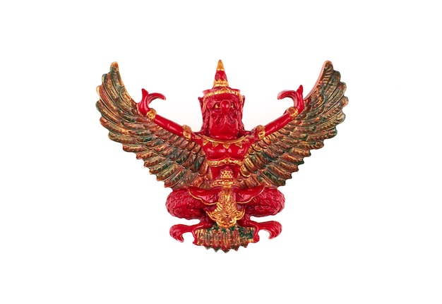 Photo red garuda statue with wings isolated on white background