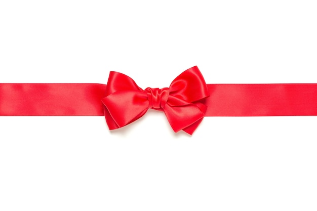 Red gift bow and horizontally crossed red ribbon isolated