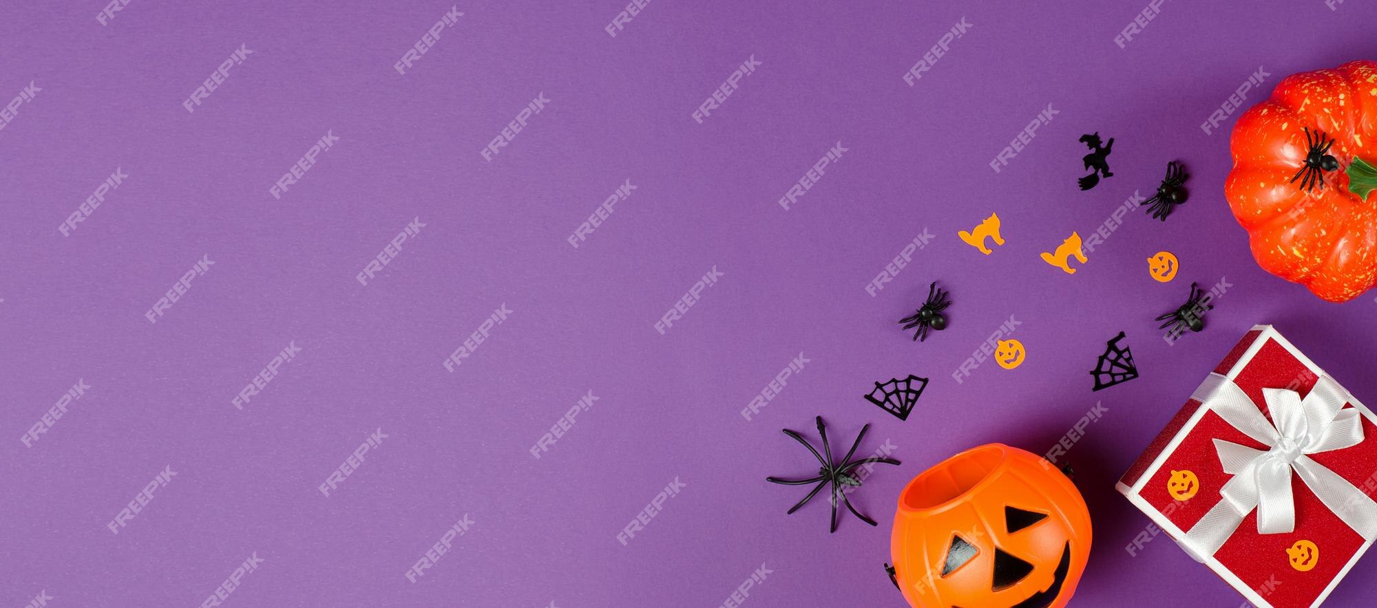 Premium Photo | Red gift box and traditional halloween decorations ...