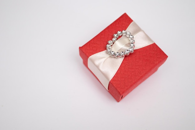 Red gift box on white background.