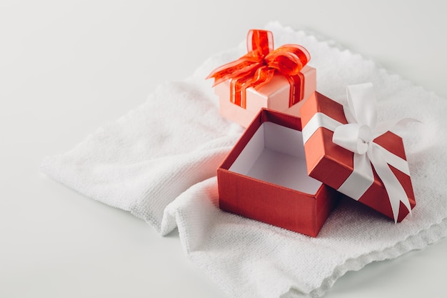 red gift box on white towel background