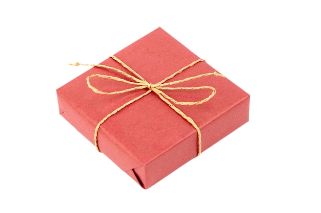 Red gift box with bow isolated on white Wrapped Christmas or birthday gift box Single holiday present