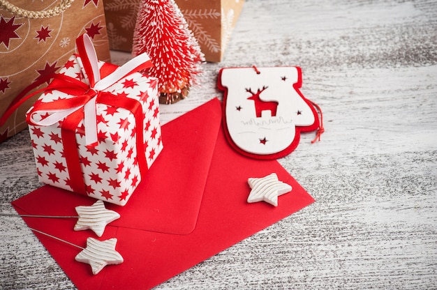 Red gift, greeting envelope and craft bags