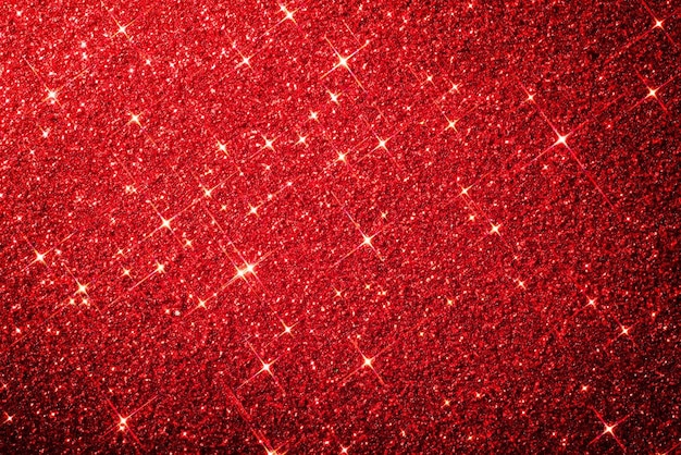 Red glitter background with the lights on it