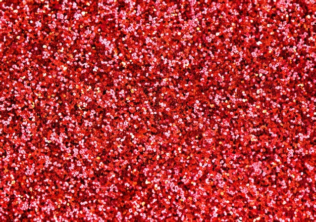 red glitter glow shiny festive background texture