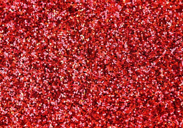 red glitter glow shiny festive background texture