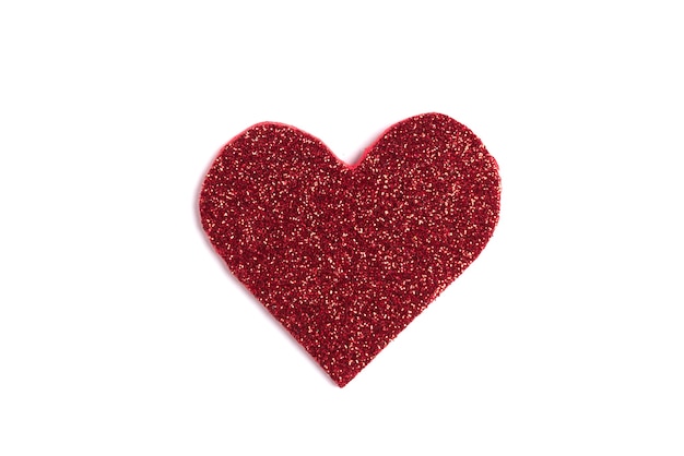 Photo red glitter heart isolated on white.