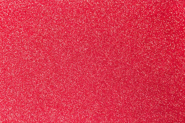 Red glitter shiny texture for christmas, Celebration concept.