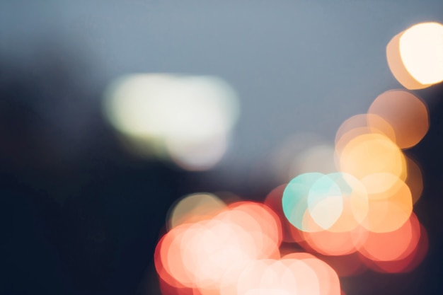 Red glitter vintage lights background. defocused