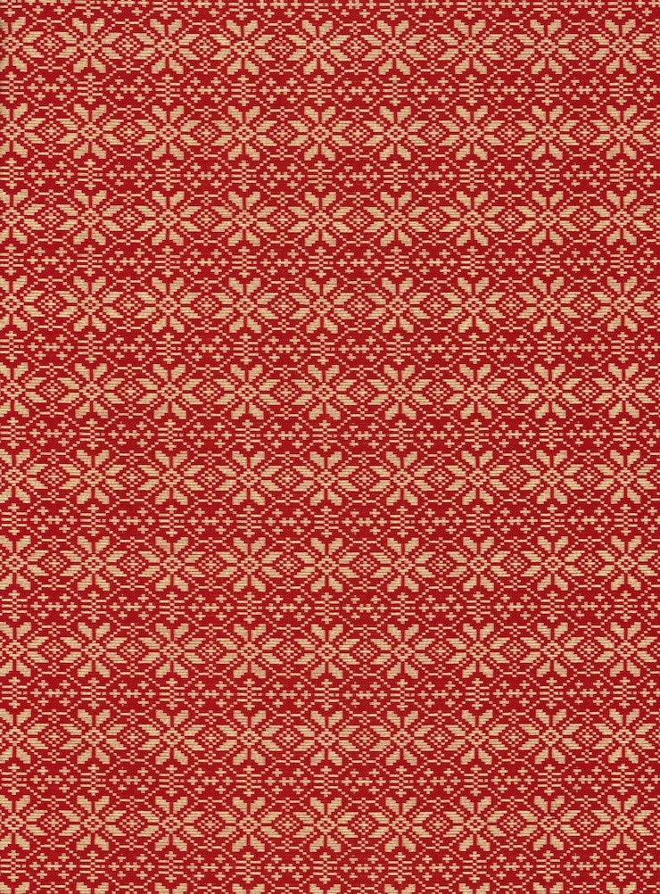 Photo red and gold fabric with a gold pattern and diamond design