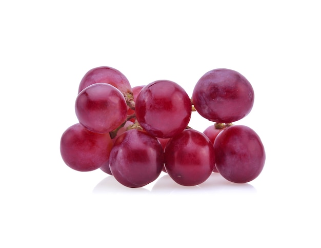 Red grapes isolated on white background.