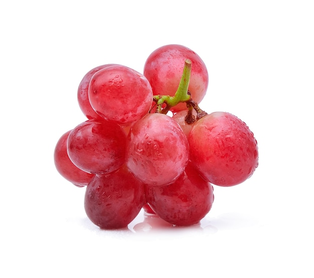 Red grapes and water drops isolated on white,