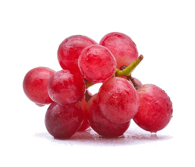 Red grapes and water drops isolated on white