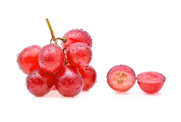 Red grapes and water drops isolated