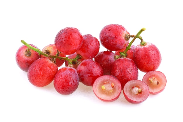 Red grapes with water drops isolated