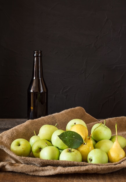 red and green apples. Apples in bowl. Yellow pears. Apple cider. Fruit vinegar. Apple vine