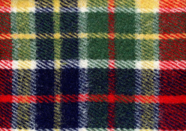 Red green blue and yellow tartan fabric texture background