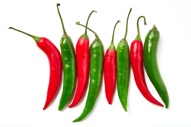 Red and green chili pepper. red and green chili pepper of different shapes isolated