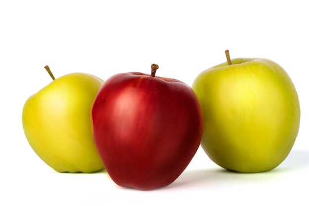 Red and green fresh apples on a white background