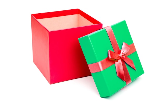 Red and green gift box with ribbon isolated on white background Clipping path