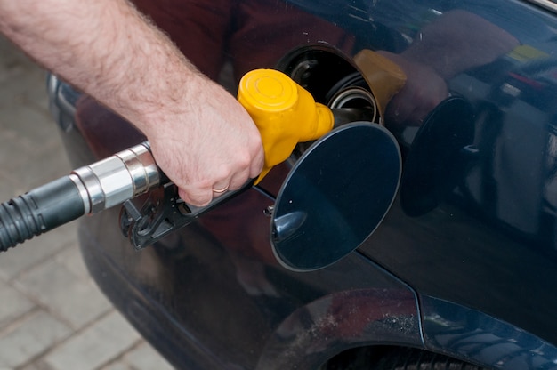 Rosso verde giallo arancio colore carburante distributore di benzina sfondo