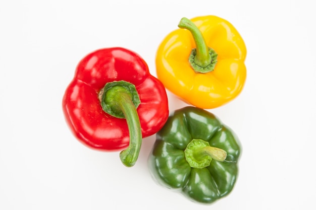 Red green and yellow peppers 