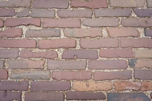 Red grunge brick wall abstract background texture with old dirty and vintage style pattern