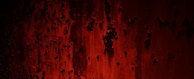 Red Grunge wall texture. Dark red grunge background. Horror Cement texture