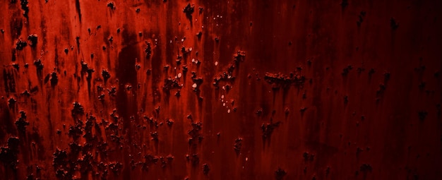 Photo red grunge wall texture. dark red grunge background. horror cement texture