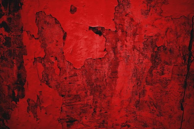 Foto tessura di parete grunge rossa sfondo horror rosso e nero