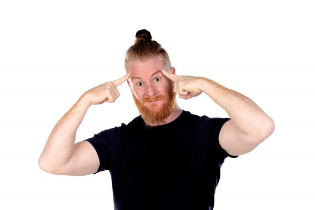 Red haired man with long beard thinking