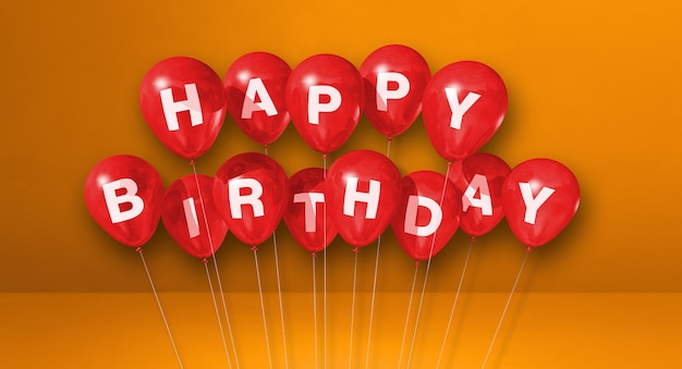 Red happy birthday air balloons on orange wall scene. . 3D illustration render