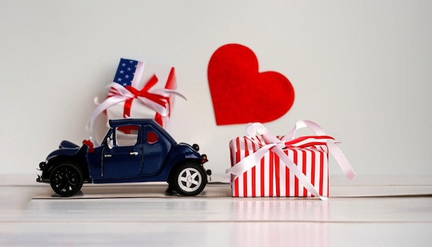 A red heart and a blue car with a red and white ribbon on the front.