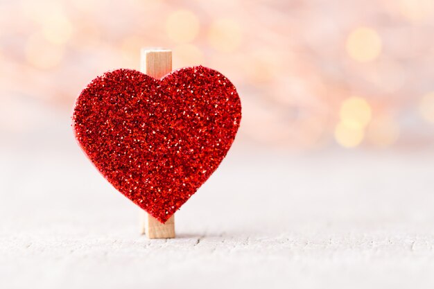 Red heart in bokeh lights background