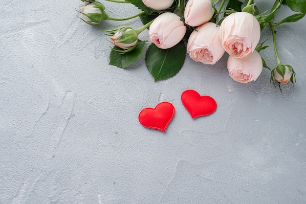 red heart and bush roses, valentine's day, the concept of love. copy space.